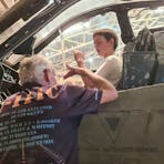Young boy in cockpit of plane