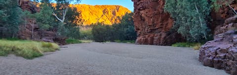The sun shining on Trephina Gorge