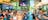 many people eating and drinking chatting and watching televisions on every wall showing every sport