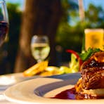 Dish served with a glass of wine at the Darwin Sailing Club