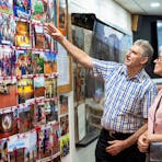 Visitors admiring the historic photos