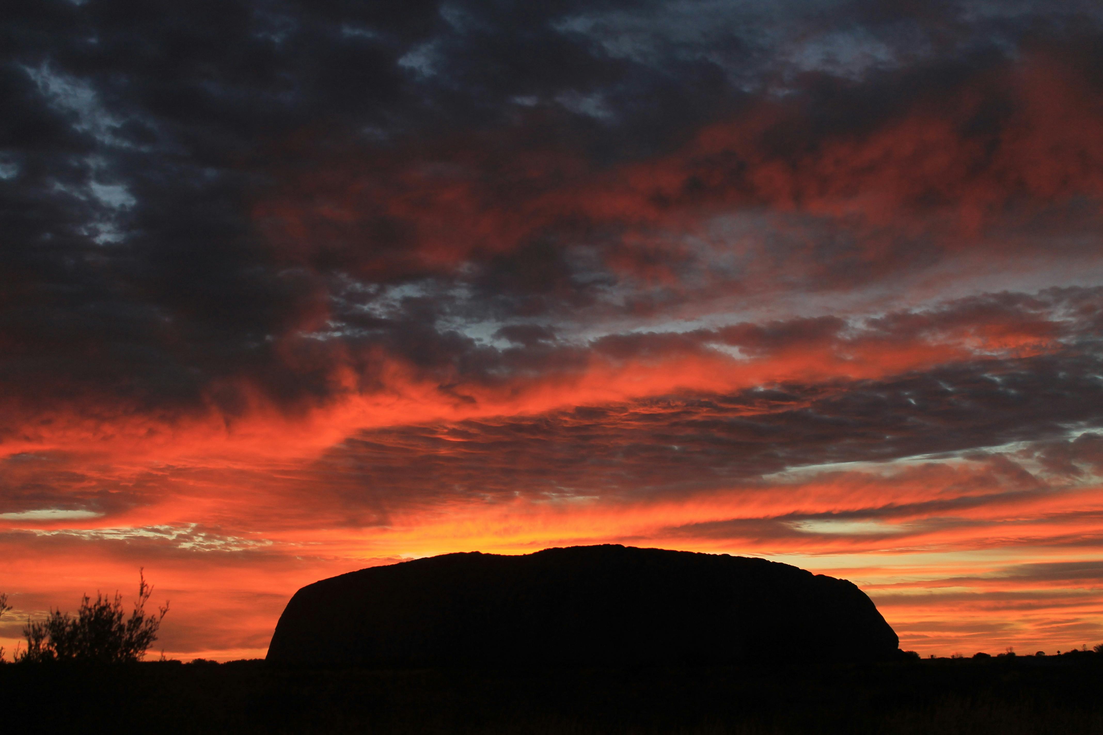 We go back to where we watched the sunset on Uluru, to see the silhouette with fire behind it!