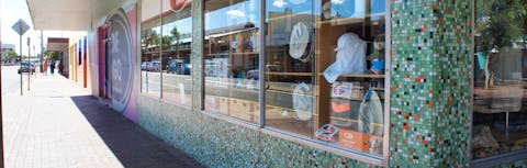 Detail view of Heenan Building, featuring original glass tiles to exterior walls.