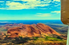 A picture of Kata Tjuta taken from a small aircraft
