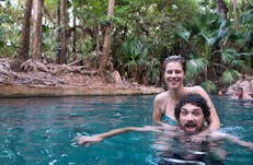 two people swimming in thermal springs
