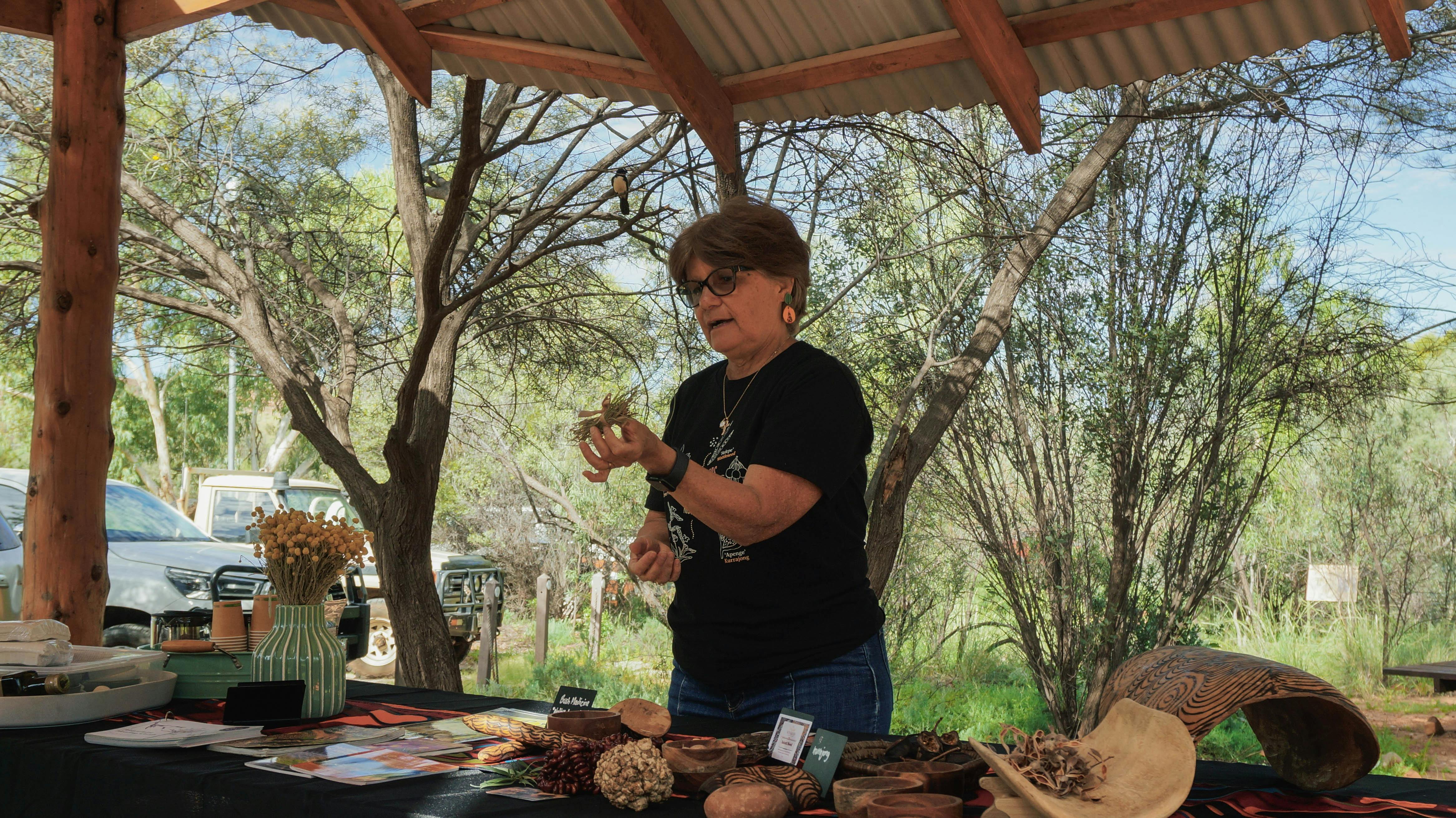 Kungkas Can Cook owner Rayleen Brown delivering a tour at the Olive Pink Botanic Garden