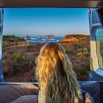 A customer admiring the Great Ocean Road views