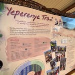 Photo of the Yeperenye Trail trailhead sign at Emily Gap