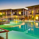 Time lapsed photo of the luxurious Lagoon Resort Rooms, with the Lagoon in the foreground