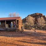 Set alongside a rockface, with the private ensuite overlooking it from the bath,