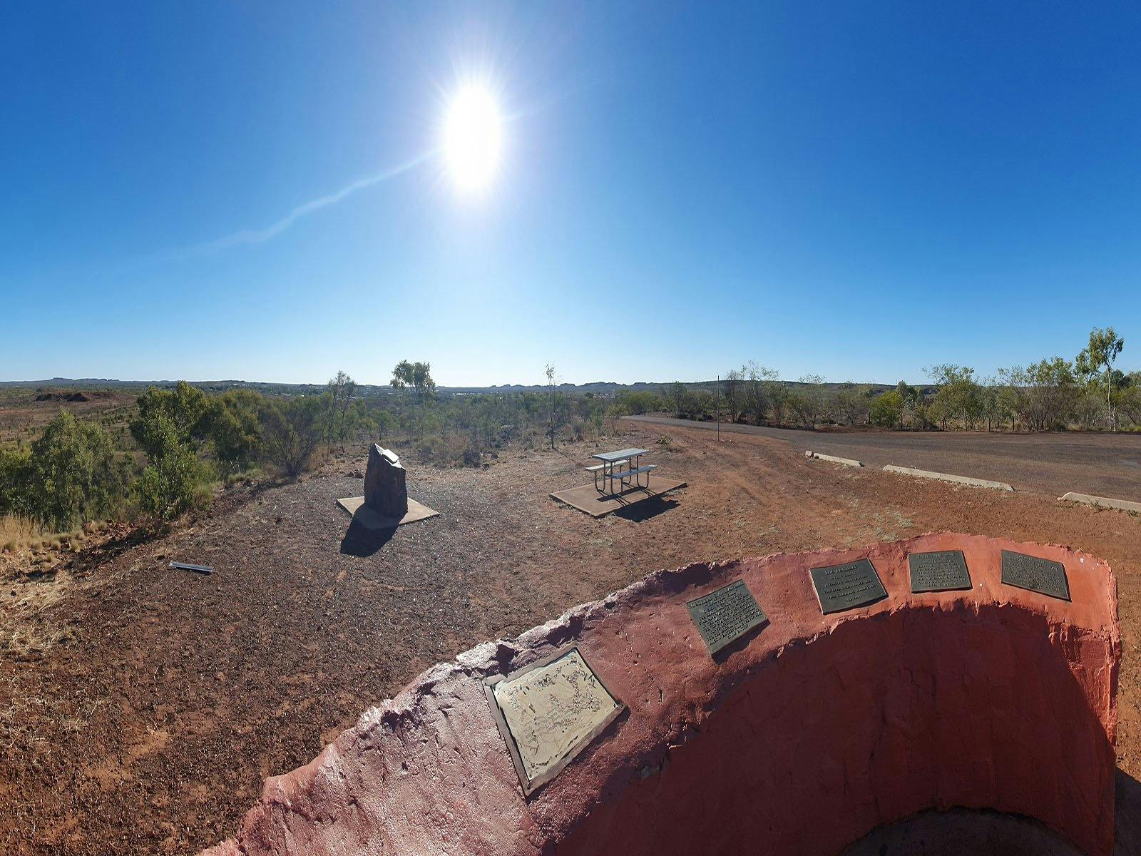 plaques on a brick wall