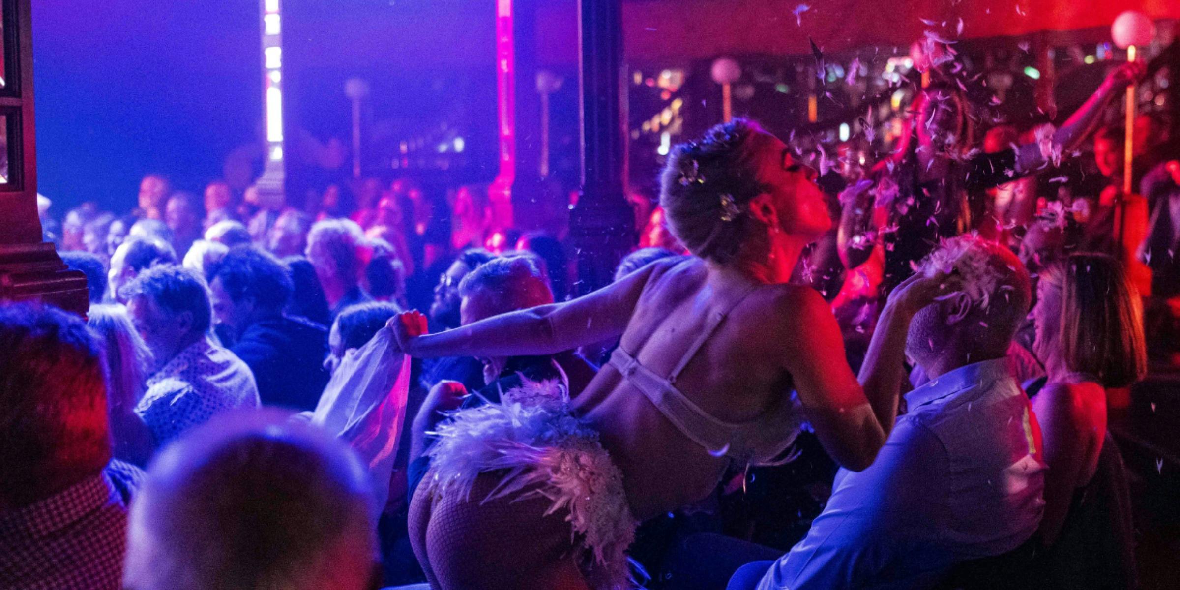 Dancer interacteing with audience members in The Spiegeltent