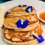 Pancakes with syrup and ice cream