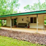 Sit and watch the world go by from the day lounge on the front verandah.