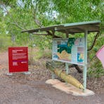 Identification signage and interpretive shelter to Stores.