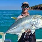 Gavin aboard the Australian Sportfishing Charters with a large Trevally
