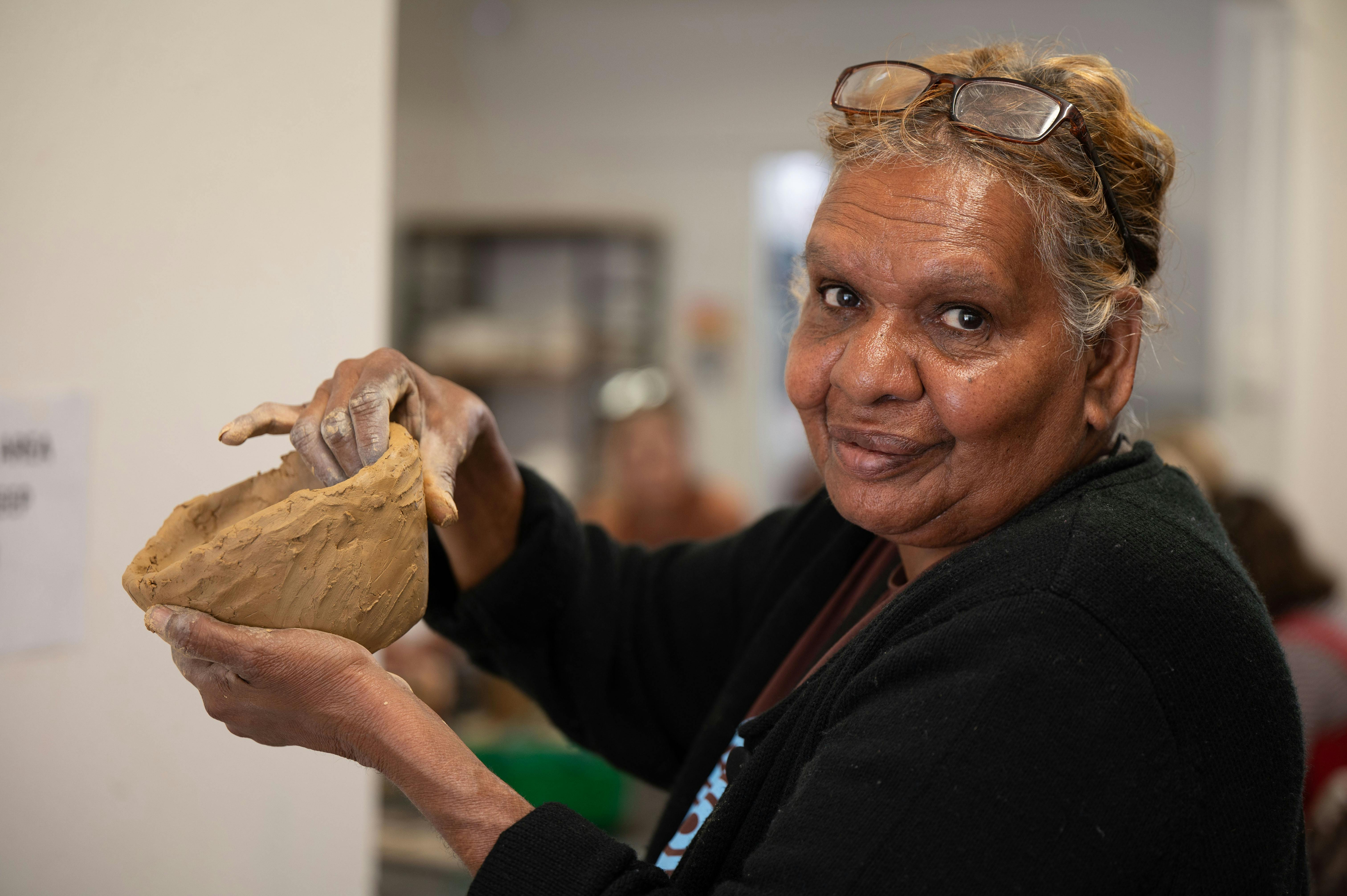 Hayley Panangka Coulthard, Hermmansburg Potters Ceramics Workshop at Desert Mob Marketplace 2025.