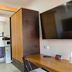 Fridge, Tea & coffee making facilities, kitchenette, featuring a microwave