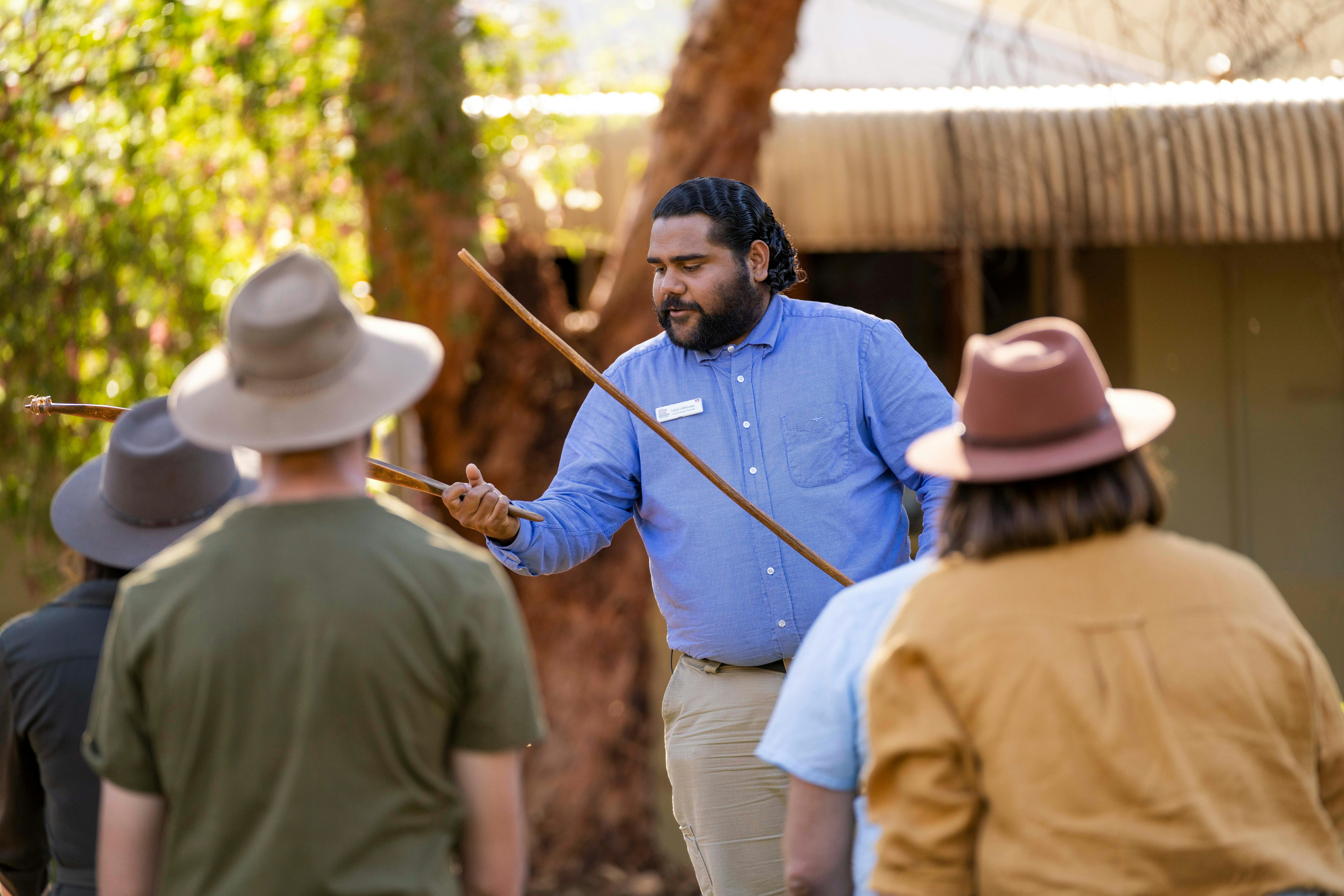 Man Showing Tool to an Audience