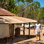 A couple exploring Blyth Homestead in Litchfield National Park