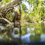 Woman swimming in Bitter Springs