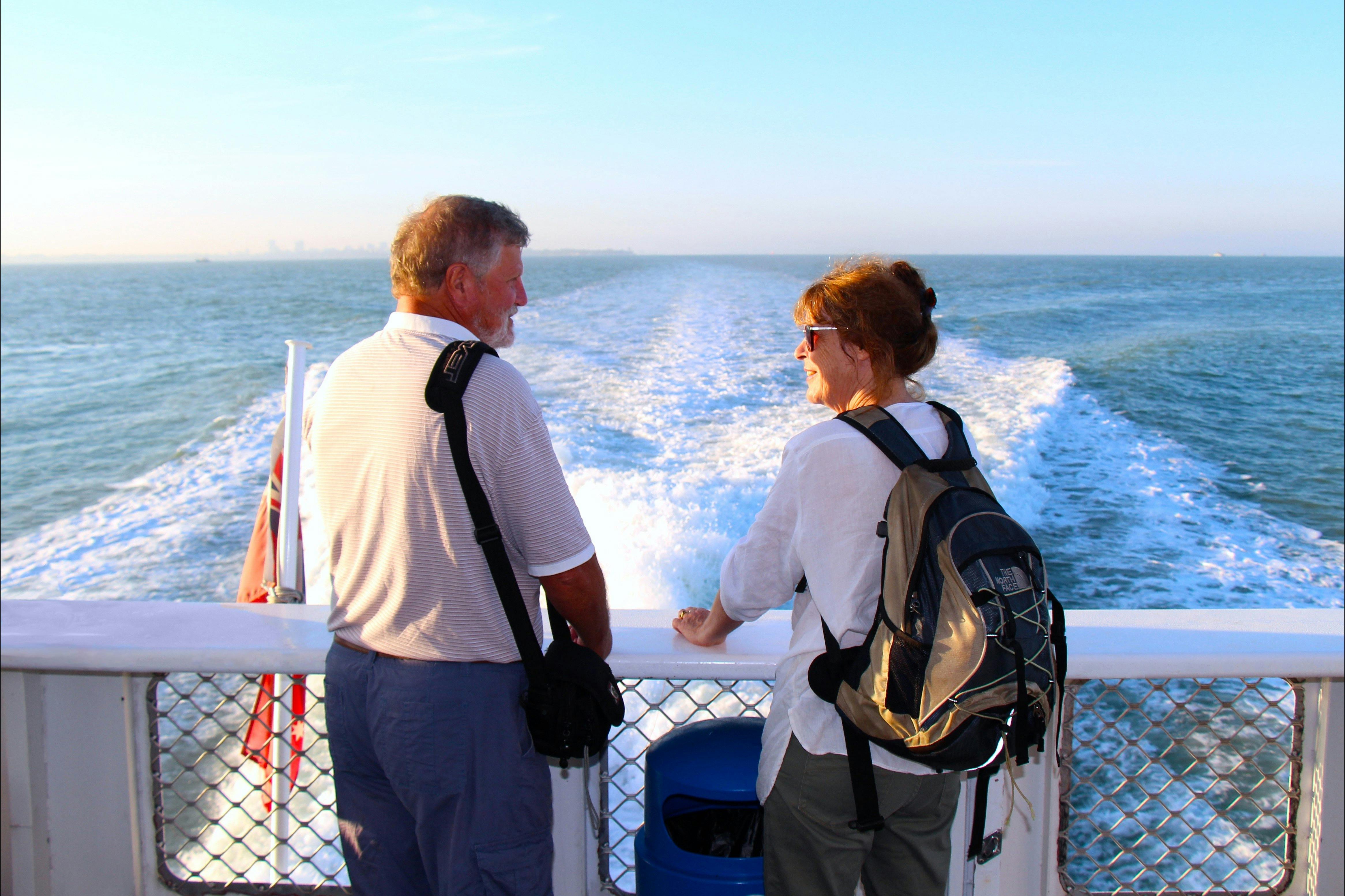 A couple of tourists on the ferry to the Tiwi Islands