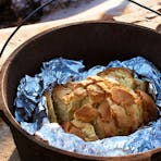 Watch the distant domes of Kata Tjuta come into view and enjoy a traditional Aussie breakfast.