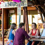 Couples enjoying a drink at Daly Waters Pub