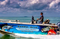 Guide Lincoln skippering the Barra or Blue's 6.1m Barra Boat