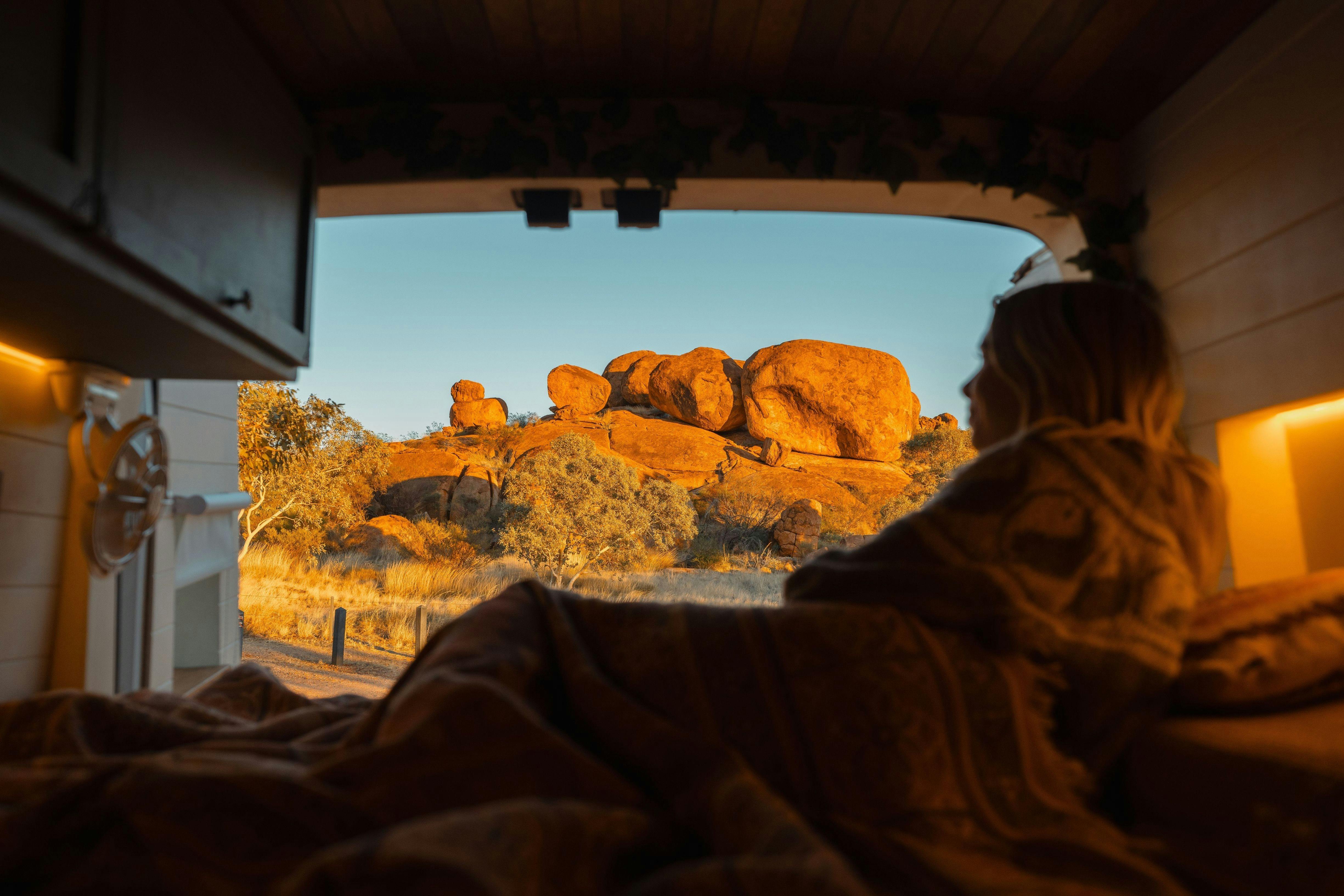 Morning at Karlu Karlu / Devils Marbles Conservation Reserve seen from inside a campervan