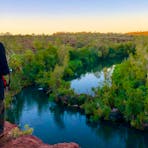 lady looking at waterfalls from viewpoint