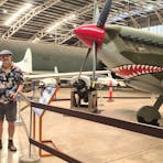 Father and daughter in front of Spitfire Replica