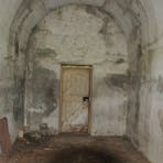 Interior of the above-ground magazine with vaulted ceiling.