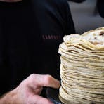 A stack of housemate corn tortillas
