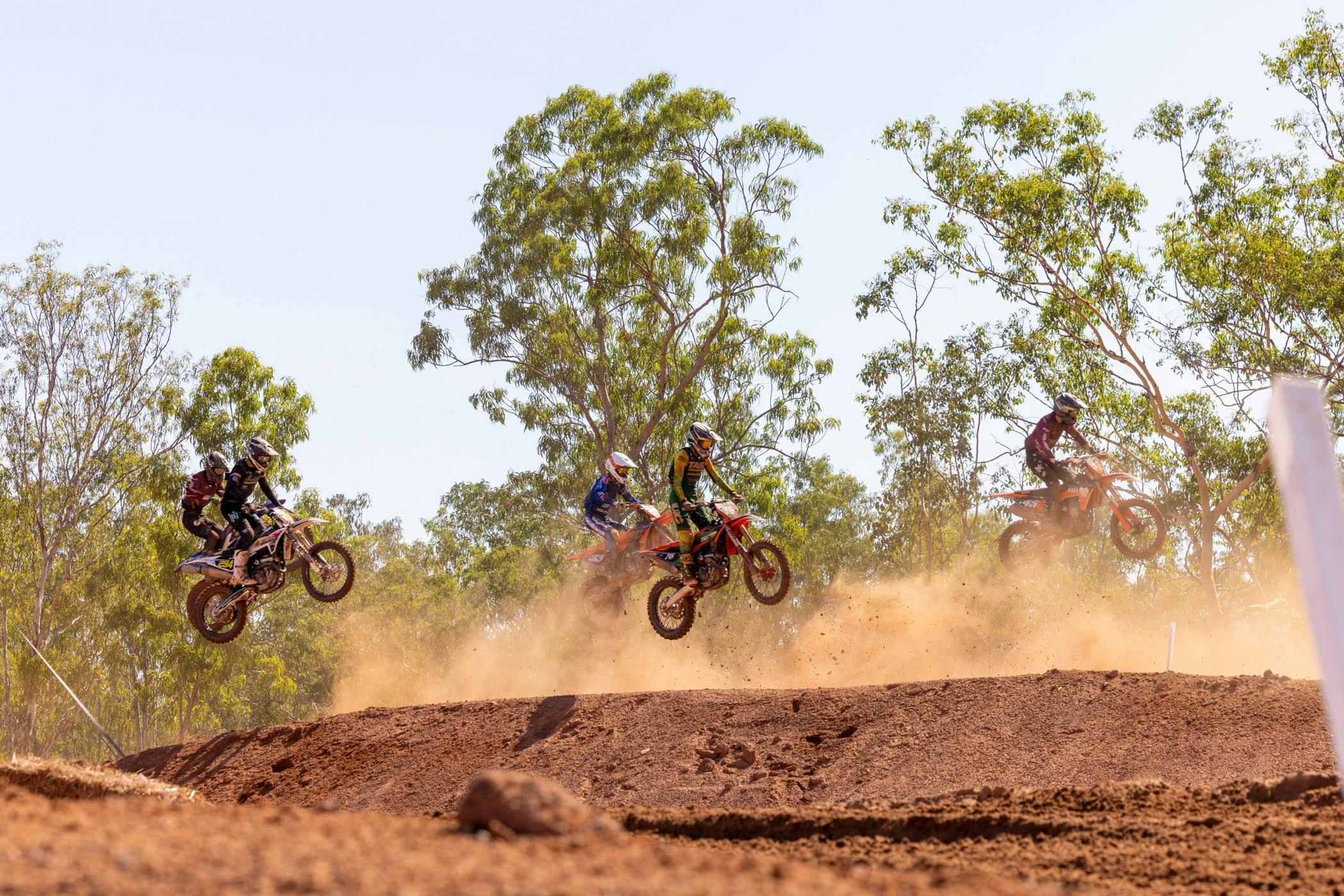MXGP bikes jumping on track