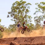 MXGP bikes jumping on track