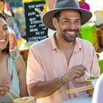 Couple enjoying themselves at the Parap Markets