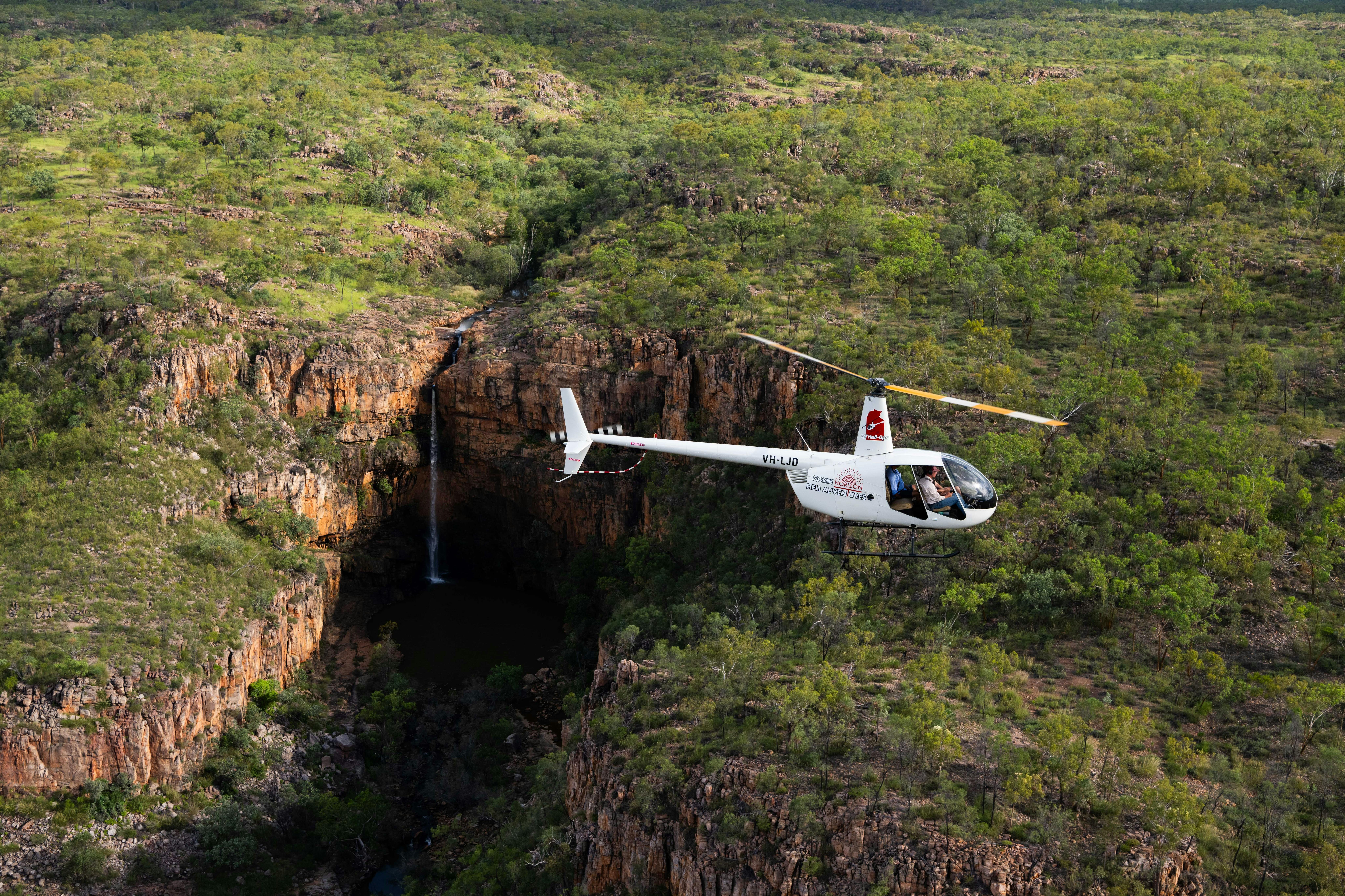 A helicopter flying over Nitmiluk National Park
