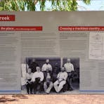 Detail of high quality interpretive signage at Attack Creek Memorial.