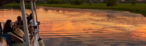 People cruising yellow water billabong