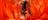 Dancer twirling in front of red background