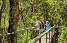 Couple walking together at Wangi Falls