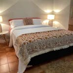 The spacious, air-conditioned main bedroom ensures a rejuvenating sleep at the end of a relaxing day
