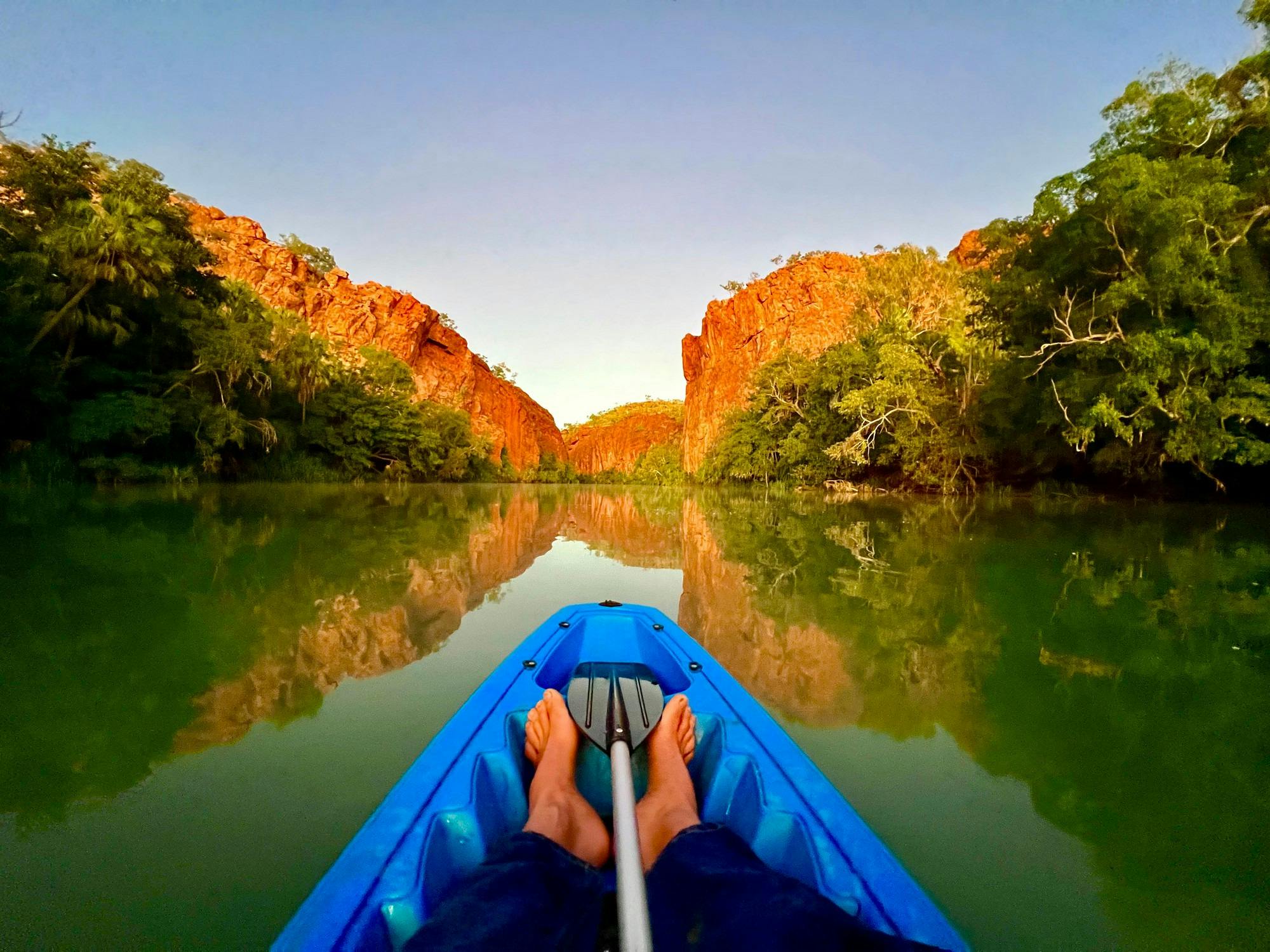 man canoeing in gorge