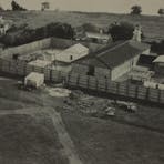 1930s Fannie Bay Gaol. Note quarry and watch tower.