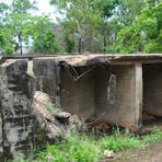 Deterioration of the concrete at one of the gun locations