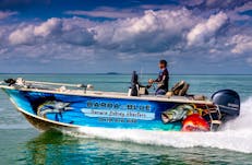 Guide Lincoln skippering the Barra or Blue's 6.1m Barra Boat