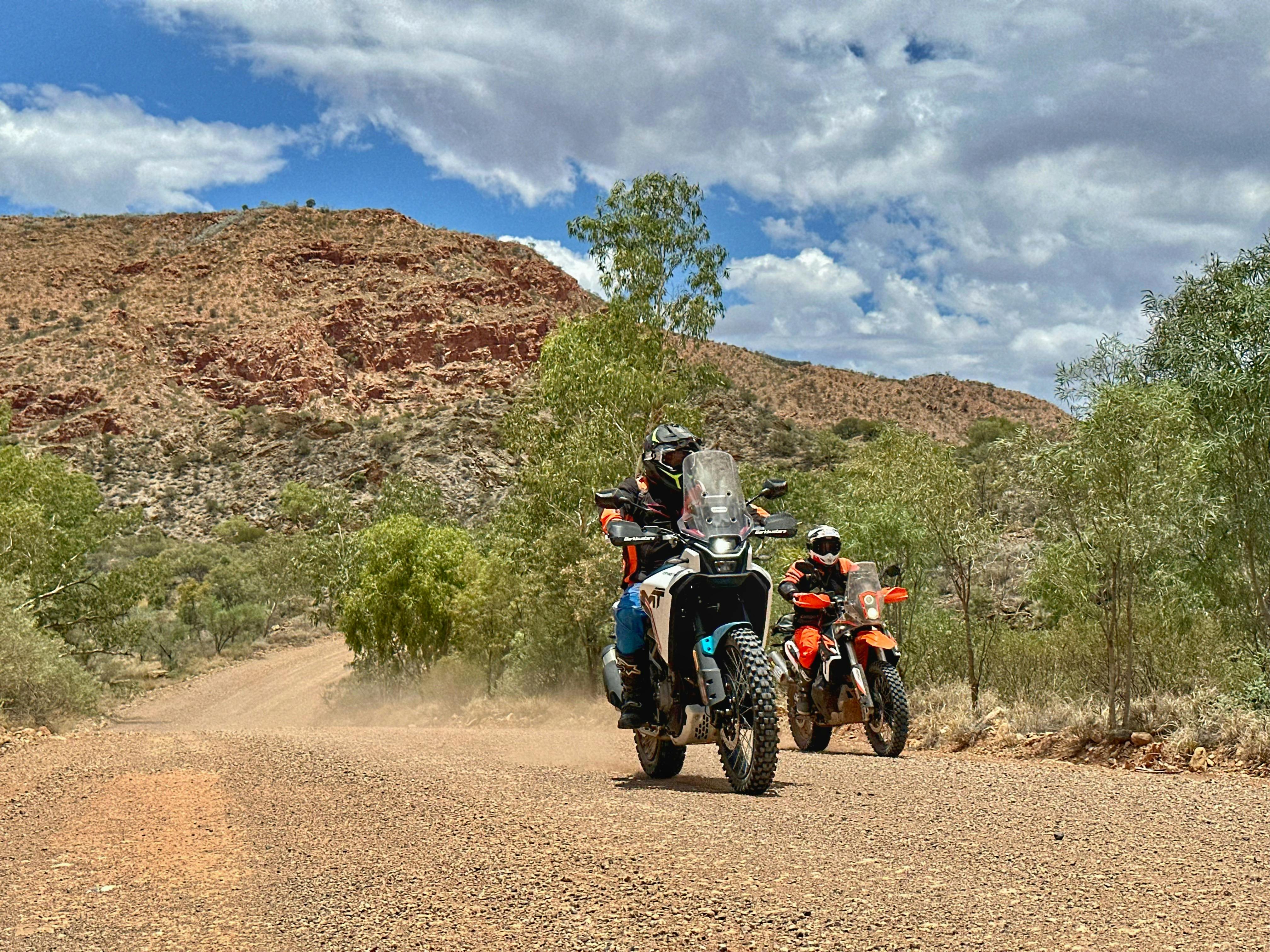 Adventure bikes riding through the picturesque Eastern MacDonnell Ranges