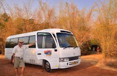 Tour driver standing next to the vehicle.