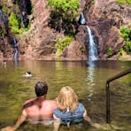 Couple taking a dip at Wangi Falls